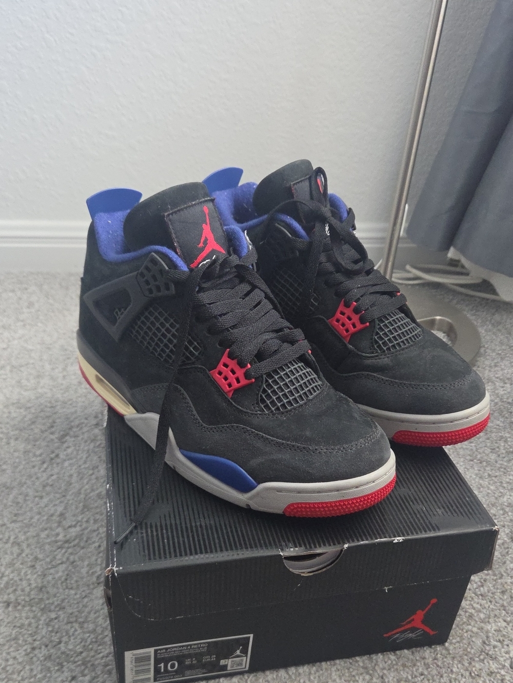 Jordan Men's Black Suede Sneakers with Red and Blue Accents
